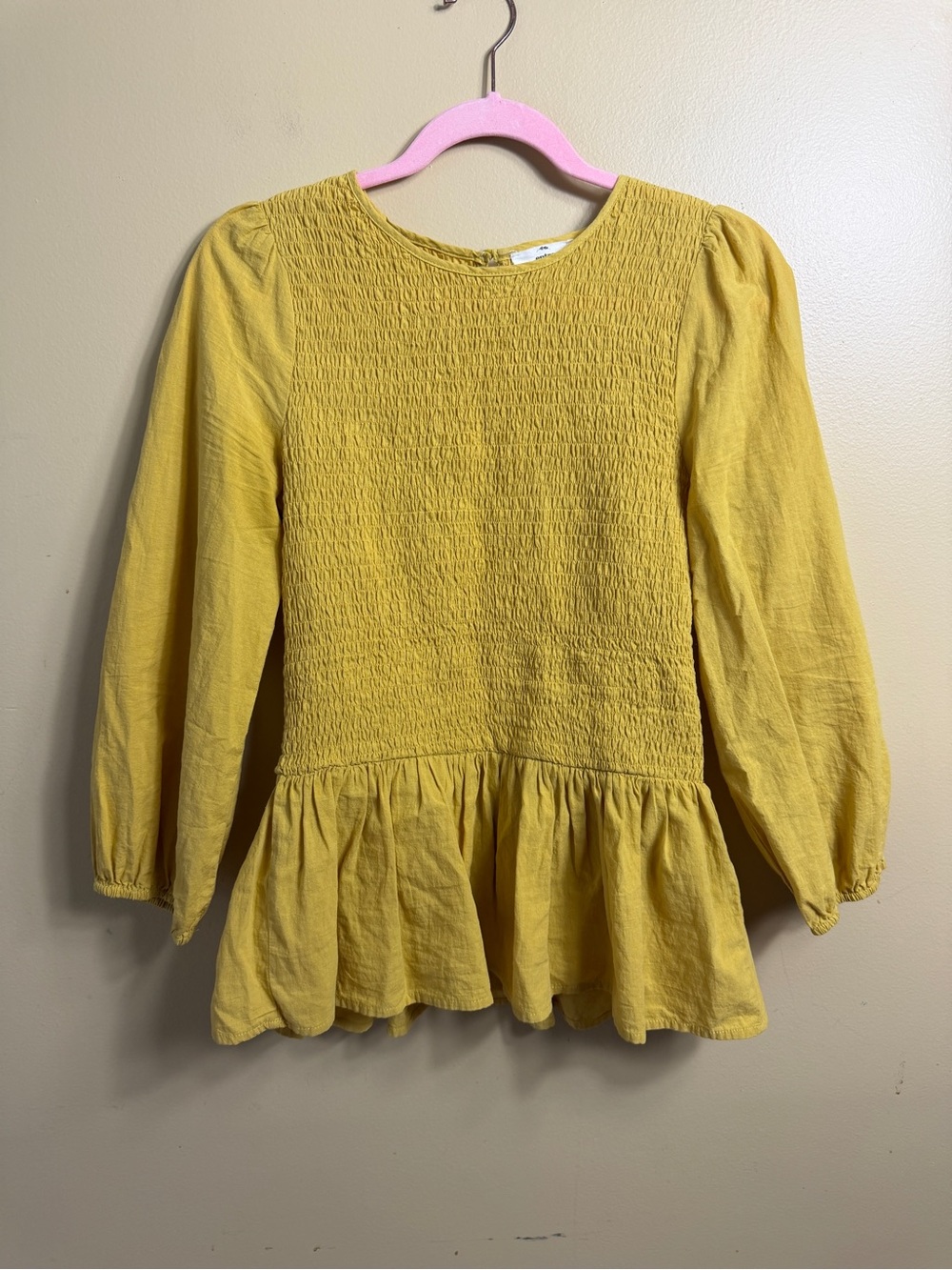 Entro mustard, yellow mocked, peplum top. Medium.